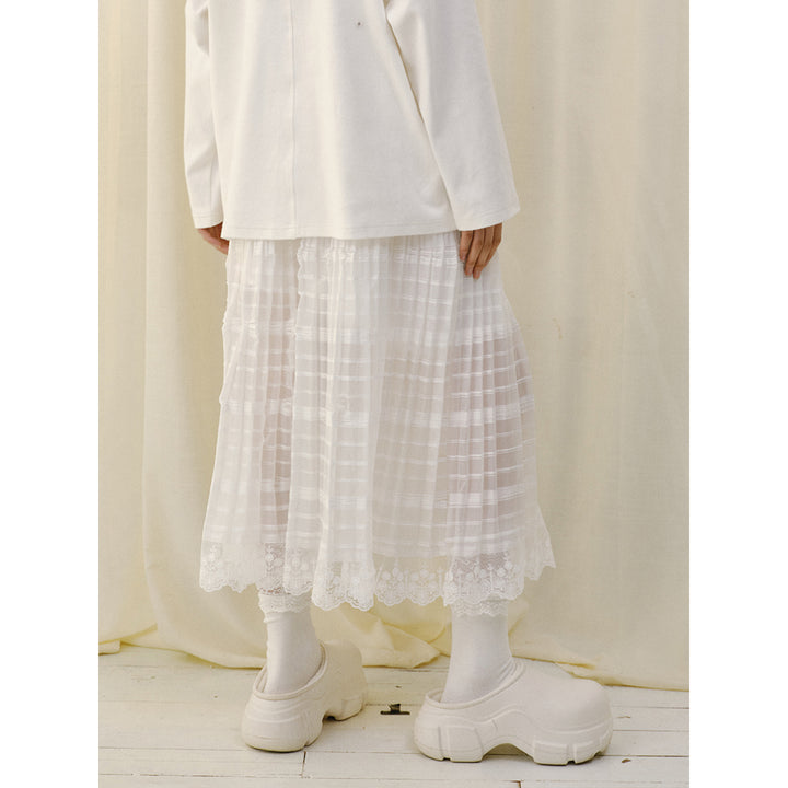 YANAG Pleated Asymmetrical Lace Trim Midi Skirt White