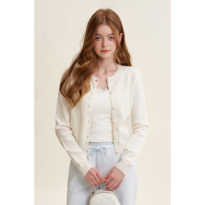 Kroche ﻿Bow Embroidery Pearl Button Knit Cardigan White